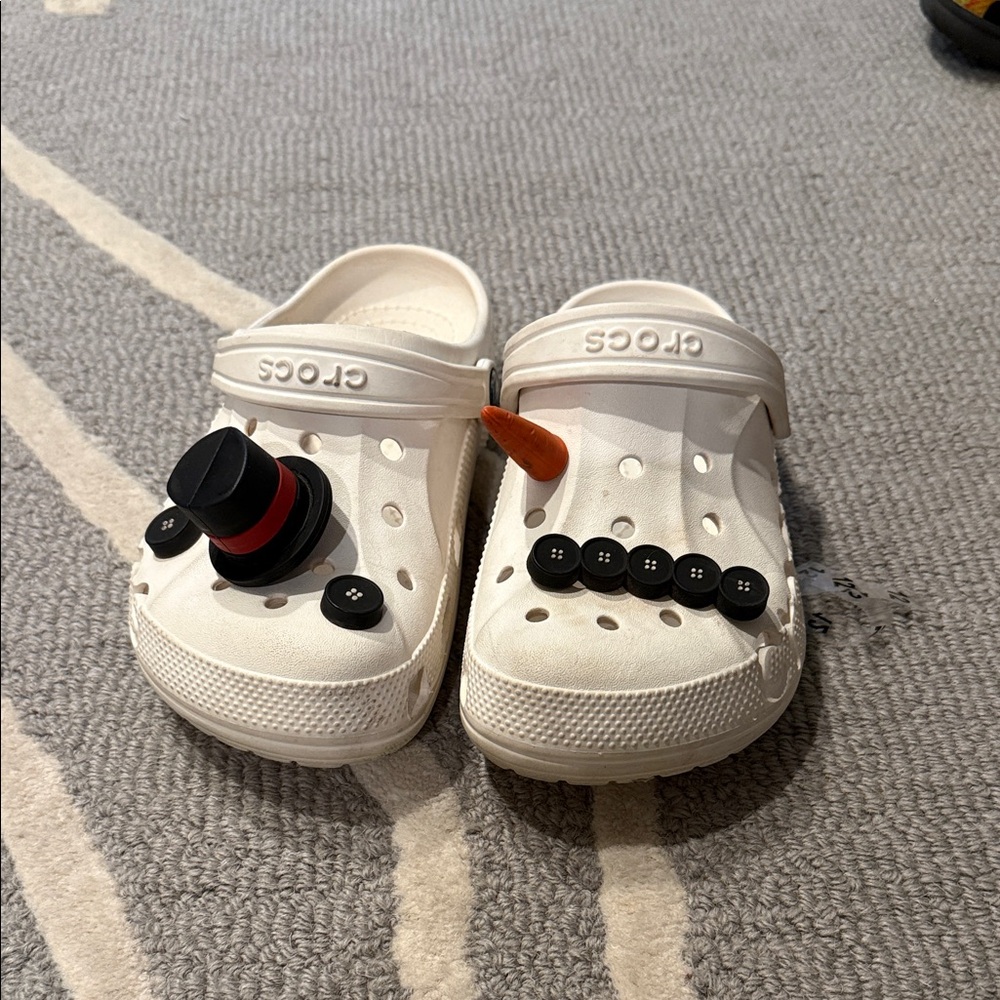CROCS Kids White Classic Clogs with Black Button Charms and Orange Accent